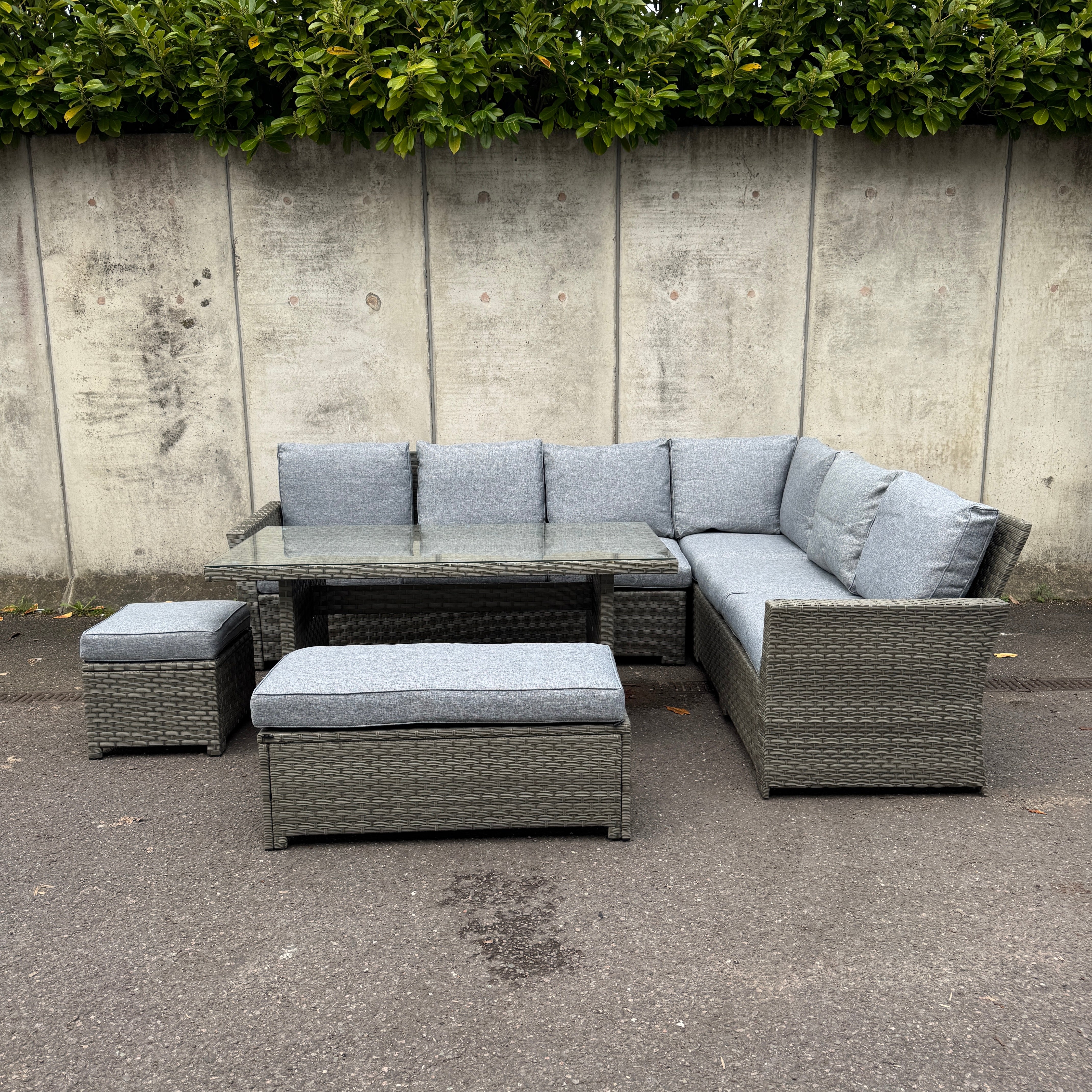 The Willow Corner Rattan Dining Set with Two Stools.