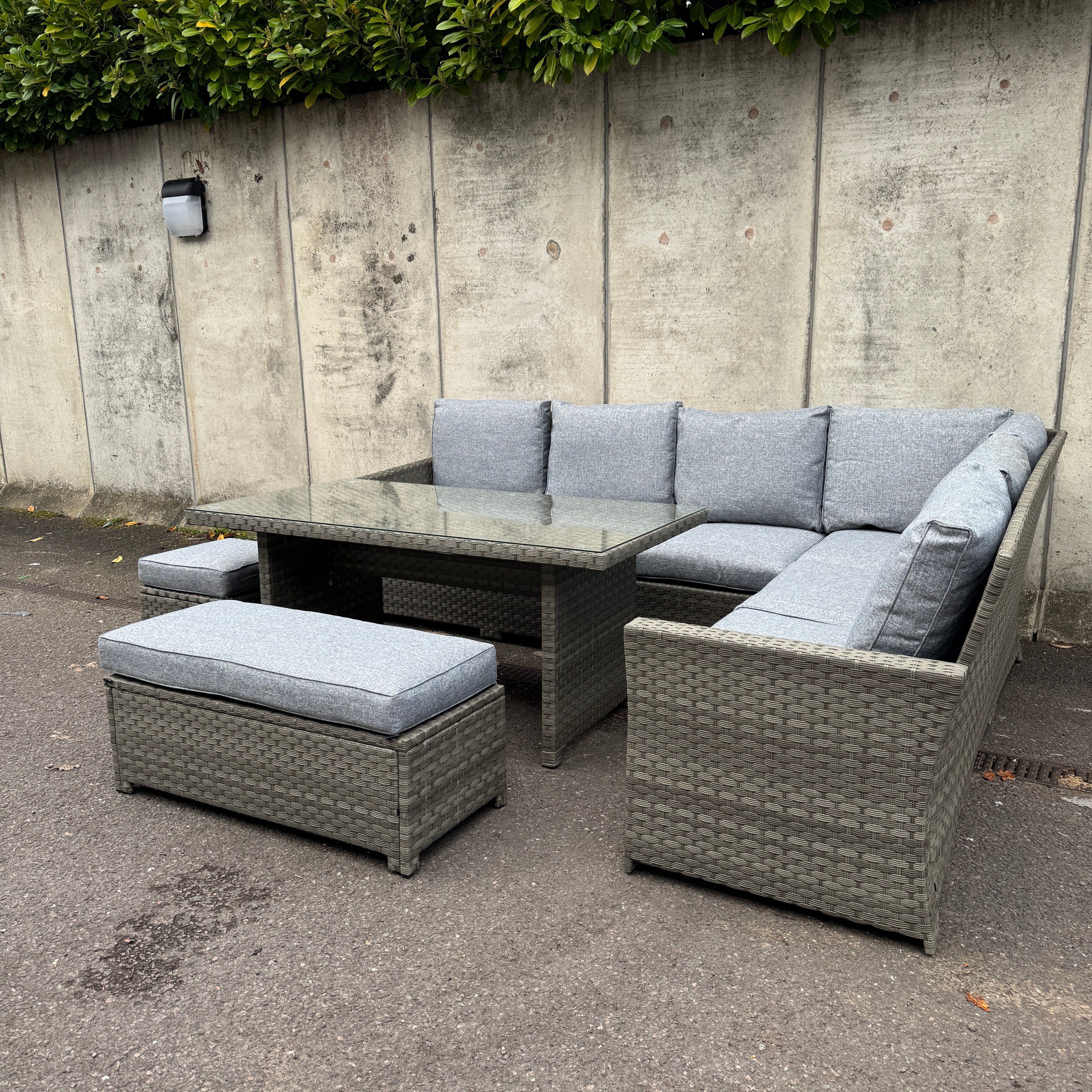 The Willow Corner Rattan Dining Set with Two Stools.